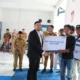 BRI Kanca Liwa Serahkan CSR Pembangunan Gapura dan Tenda UMKM di Pasar Way Batu Kabupaten Pesisir Barat